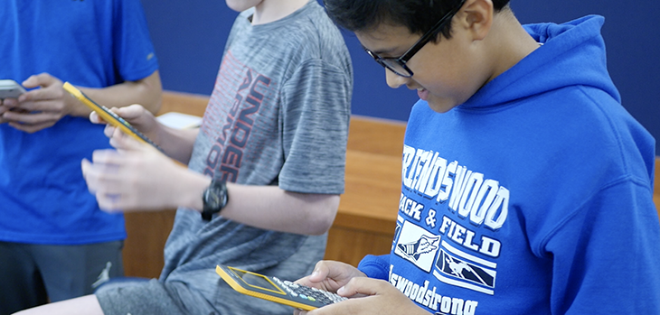 Student using a calculator